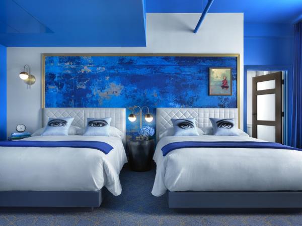 Angad Arts Hotel : photo 1 de la chambre grande chambre lit queen-size double