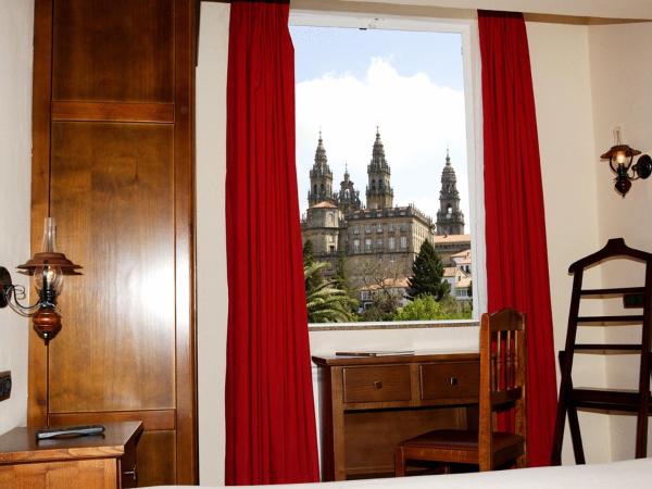 Hotel Pazos Alba : photo 1 de la chambre chambre quadruple