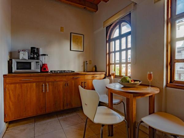 Olas Altas Suites Departamentos : photo 7 de la chambre suite lit king-size