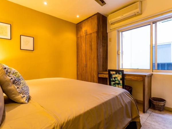 Olas Altas Suites Departamentos : photo 2 de la chambre suite lit king-size