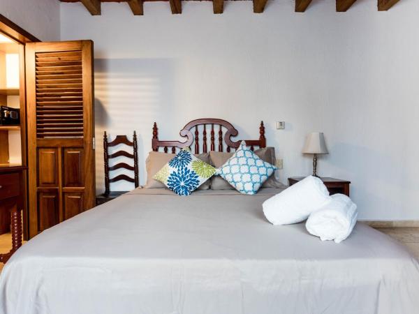 Olas Altas Suites Departamentos : photo 6 de la chambre chambre lit queen-size - vue intérieure