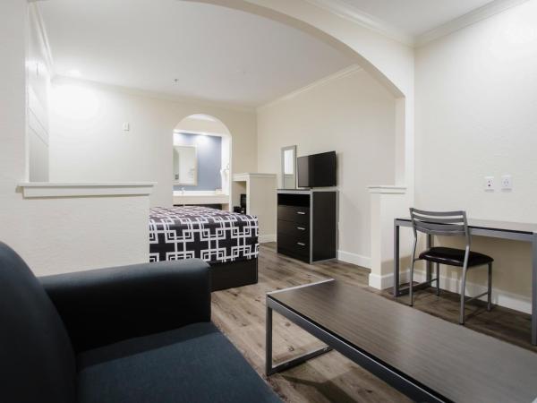 Palace Inn TX-249 : photo 2 de la chambre chambre lit king-size - fumeurs