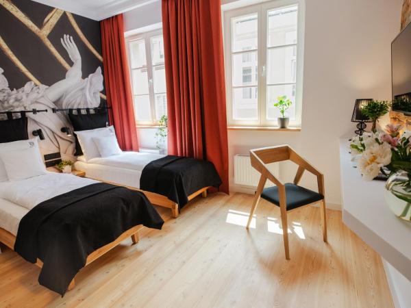 Apartamenty Schoeps Residence : photo 5 de la chambre chambre lits jumeaux supérieure