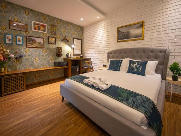 Carnarvon Suites By Reunion : photo 1 de la chambre chambre supérieure lit queen-size