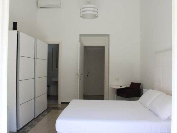Cagliari d'Amare Via Roma : photo 1 de la chambre chambre double ou lits jumeaux deluxe avec balcon