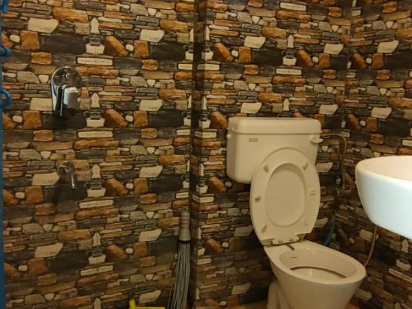 Shivam Guest House : photo 1 de la chambre chambre triple standard