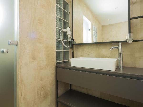 SUITES@SYNGROU-FIX : photo 1 de la chambre suite deluxe