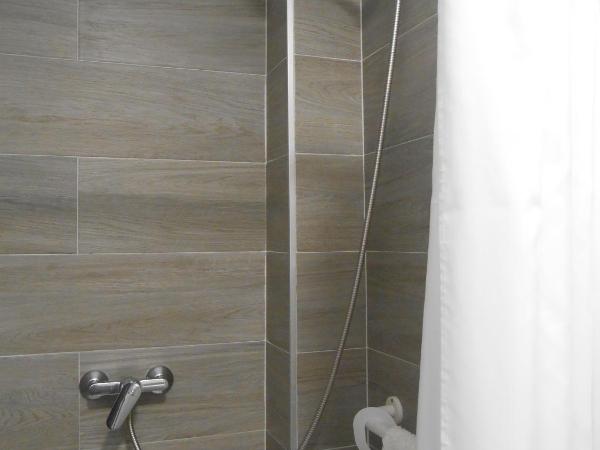 Hostal El Callejón : photo 2 de la chambre chambre lits jumeaux