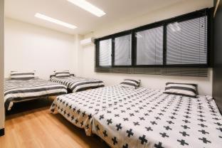 Guest House Yasuragi Hakataekimae : photo 9 de la chambre suite familiale