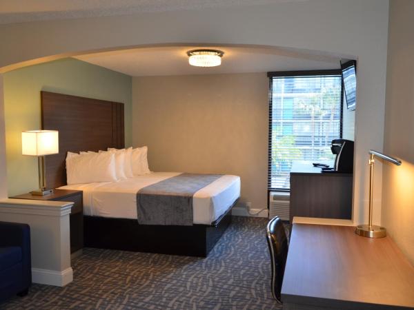 Opal Hotel & Suites : photo 6 de la chambre chambre lit king-size exécutive rénovée