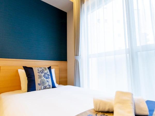 GRAND BASE Hiroshima Hikarimachi : photo 8 de la chambre chambre lits jumeaux Économique