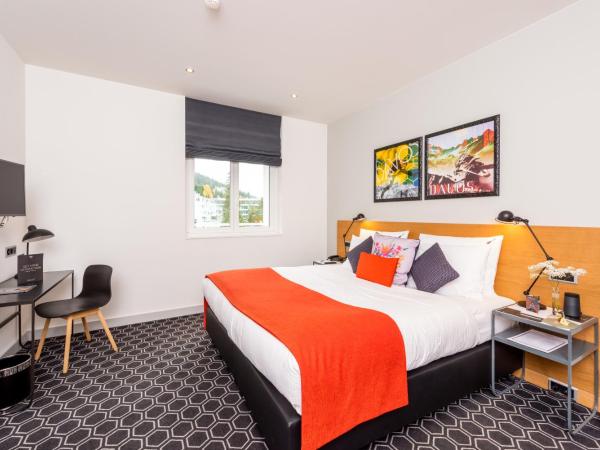 Hard Rock Hotel Davos : photo 2 de la chambre hébergement supérieur lit king-size - or