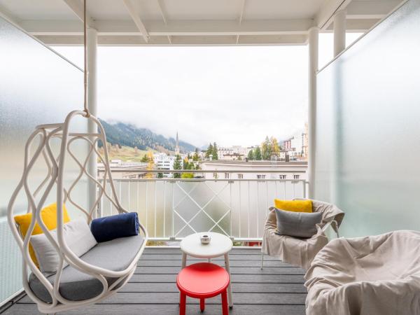 Hard Rock Hotel Davos : photo 2 de la chambre hébergement deluxe lit king-size - or