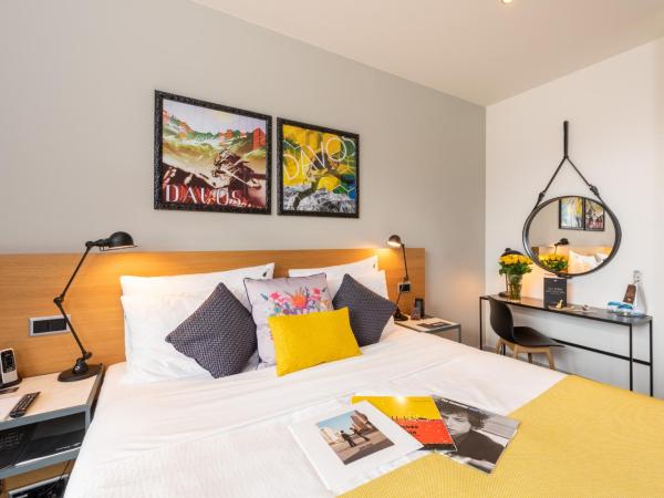 Hard Rock Hotel Davos : photo 3 de la chambre hébergement deluxe lit king-size - or