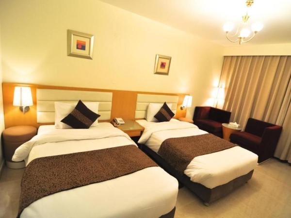 Phoenicia Grand Hotel : photo 1 de la chambre chambre deluxe double ou lits jumeaux