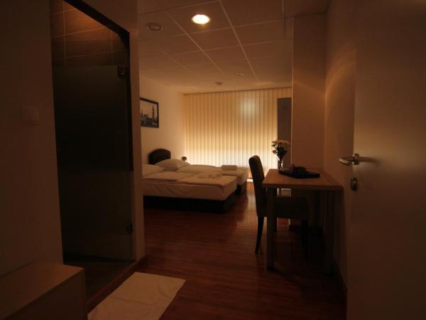 Rooms XXL : photo 1 de la chambre chambre triple