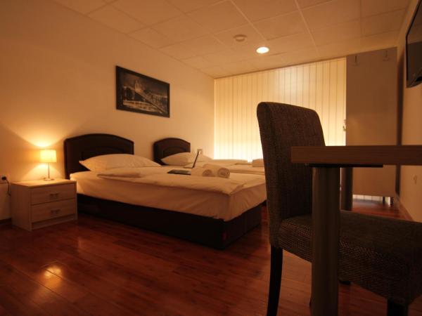 Rooms XXL : photo 5 de la chambre chambre triple