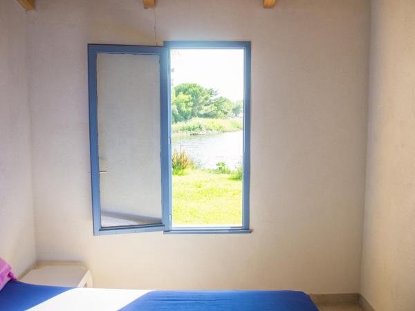 Résidence Marina di Capitello : photo 9 de la chambre appartement - vue sur lac