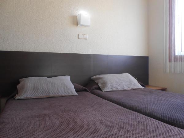 Hostal El Callejón : photo 3 de la chambre chambre lits jumeaux