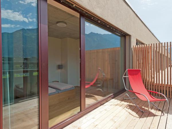 Interlaken Youth Hostel : photo 1 de la chambre chambre quadruple avec balcon