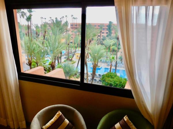 Kenzi Rose Garden : photo 6 de la chambre chambre double ou lits jumeaux supérieure - vue sur piscine