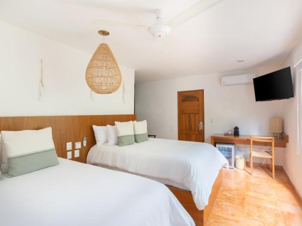 Mereva Tulum : photo 4 de la chambre suite chambre double - vue sur jardin