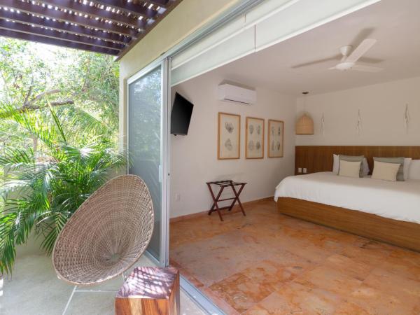 Mereva Tulum : photo 1 de la chambre suite chambre double - vue sur jardin