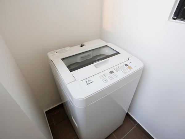 Pinnacle Tower Homestay by Home Cube : photo 9 de la chambre appartement 3 chambres