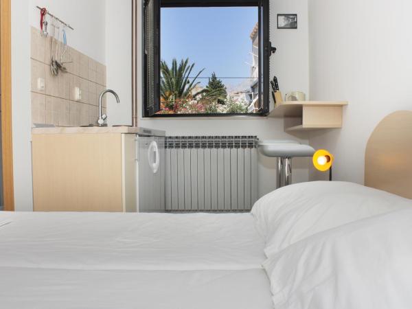 Obradović rooms & apartments : photo 2 de la chambre studio lit king-size