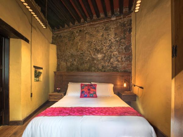 Los Camilos : photo 1 de la chambre suite - vue sur jardin