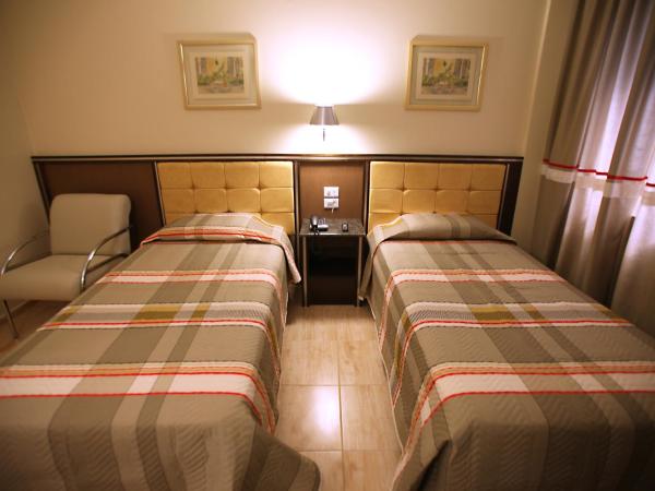 Soneca Plaza Hotel : photo 2 de la chambre chambre lits jumeaux