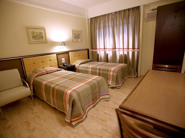 Soneca Plaza Hotel : photo 3 de la chambre chambre lits jumeaux