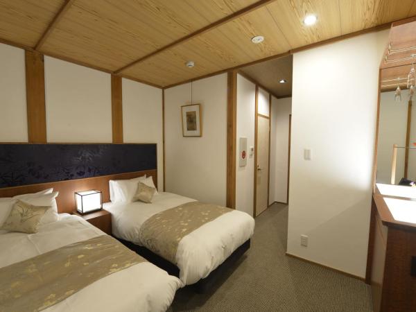 Gion Oyado Kikutani : photo 6 de la chambre chambre lits jumeaux - vue sur jardin