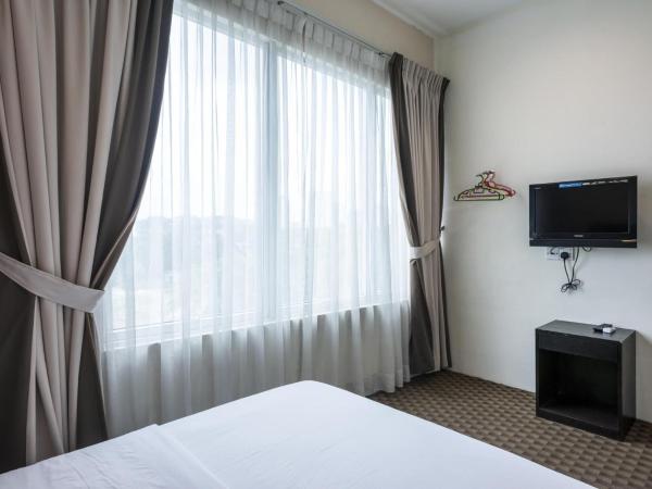 Raintree Hotel : photo 2 de la chambre chambre supérieure lit queen-size