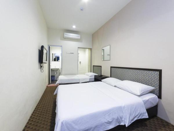 Raintree Hotel : photo 2 de la chambre chambre triple confort