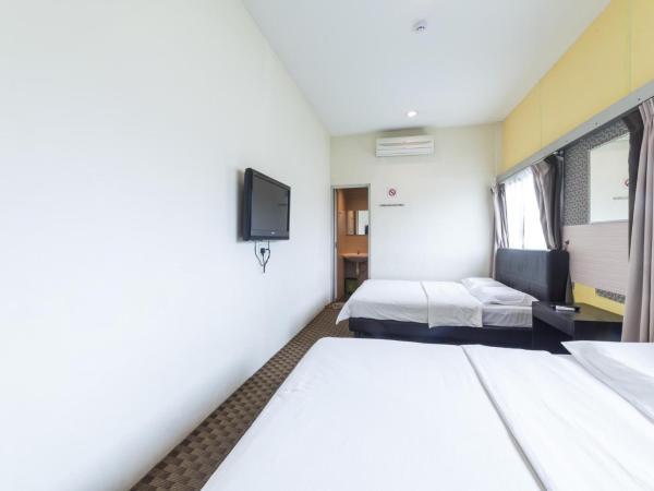 Raintree Hotel : photo 3 de la chambre chambre quadruple confort