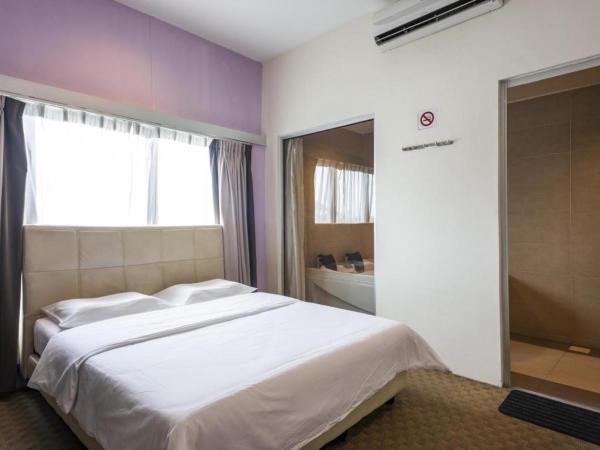 Raintree Hotel : photo 3 de la chambre suite avec jacuzzi