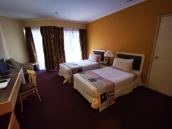 The Grand Beach Resort Port Dickson : photo 2 de la chambre chambre lits jumeaux standard