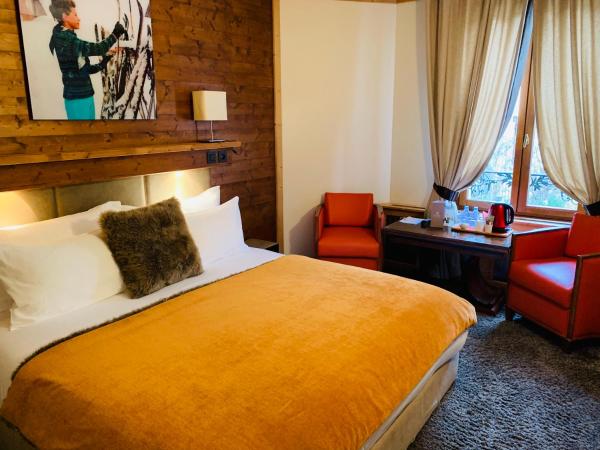 Coeur des Neiges : photo 2 de la chambre chambre double ou lits jumeaux standard