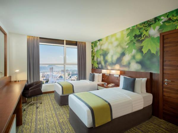 Wyndham Garden Muscat Al Khuwair : photo 3 de la chambre chambre lits jumeaux - non-fumeurs