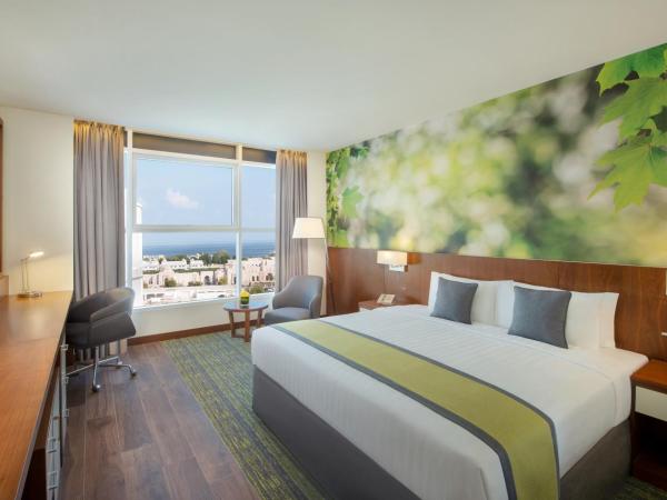 Wyndham Garden Muscat Al Khuwair : photo 5 de la chambre chambre lit king-size supérieure - non-fumeurs