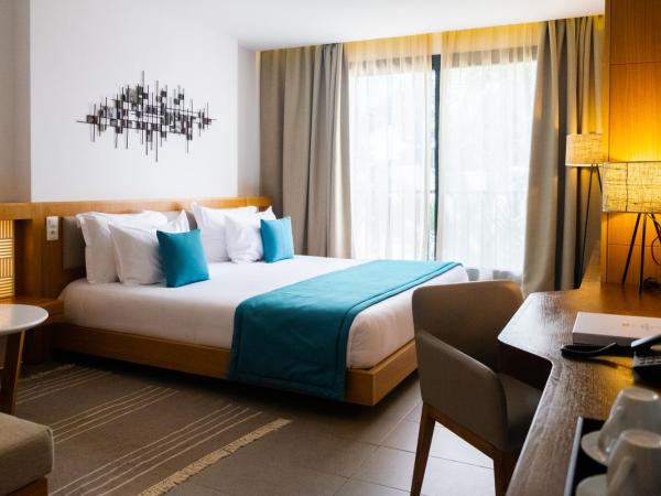 Les Orangers Garden Villas and Bungalows Ultra All inclusive : photo 1 de la chambre chambre double ou lits jumeaux - vue sur jardin