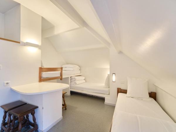 MIJE MARAIS Hostel : photo 4 de la chambre lit simple dans dortoir pour hommes