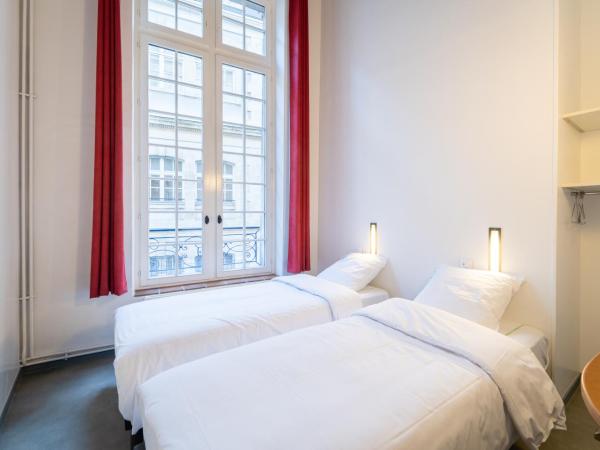 MIJE MARAIS Hostel : photo 1 de la chambre chambre lits jumeaux