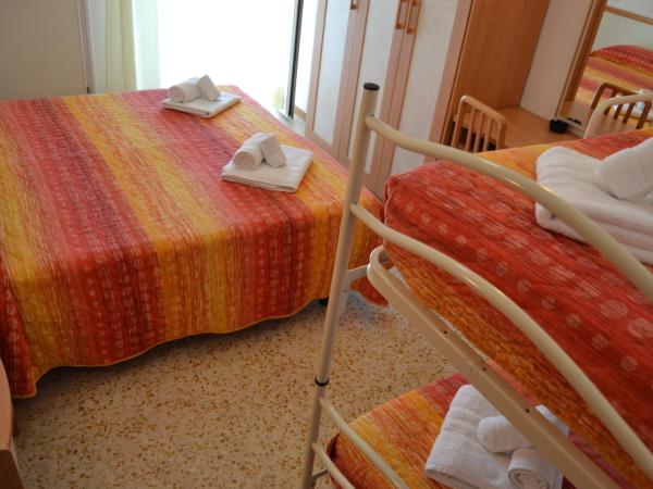 Hotel Apis : photo 2 de la chambre chambre quadruple