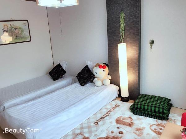 Yoshidoku Inn - Domome : photo 1 de la chambre chambre quadruple