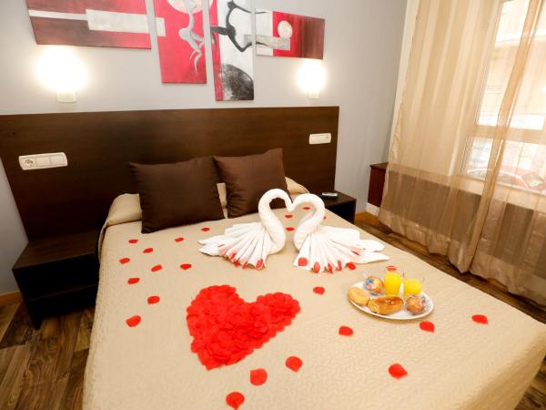 Hostal Conde David : photo 5 de la chambre suite avec baignoire spa