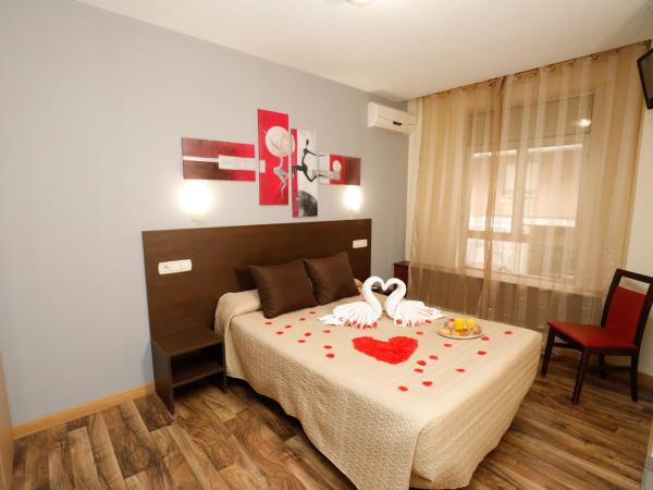 Hostal Conde David : photo 7 de la chambre suite avec baignoire spa