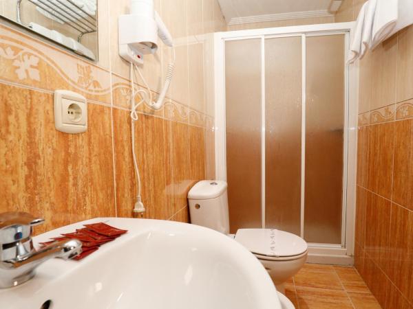 Hostal Conde David : photo 3 de la chambre chambre triple