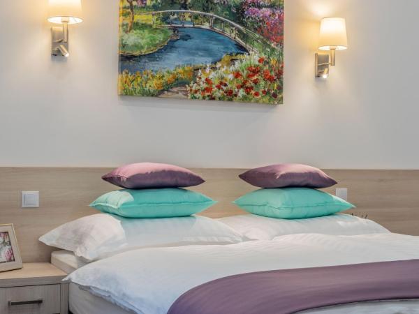 Global Suites Budapest : photo 7 de la chambre chambre double ou lits jumeaux deluxe avec balcon